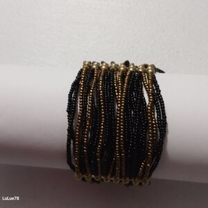 Black and Goldtone Wide Beaded Stretch Bracelet